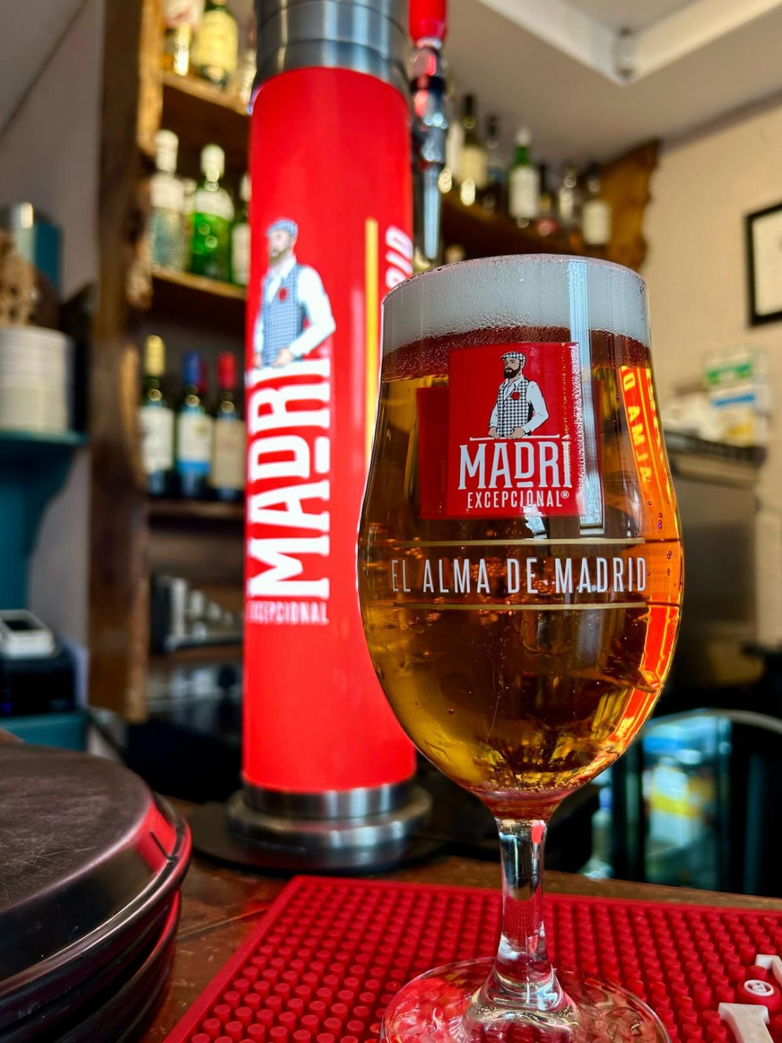 A pint of freshly poured Madri beer